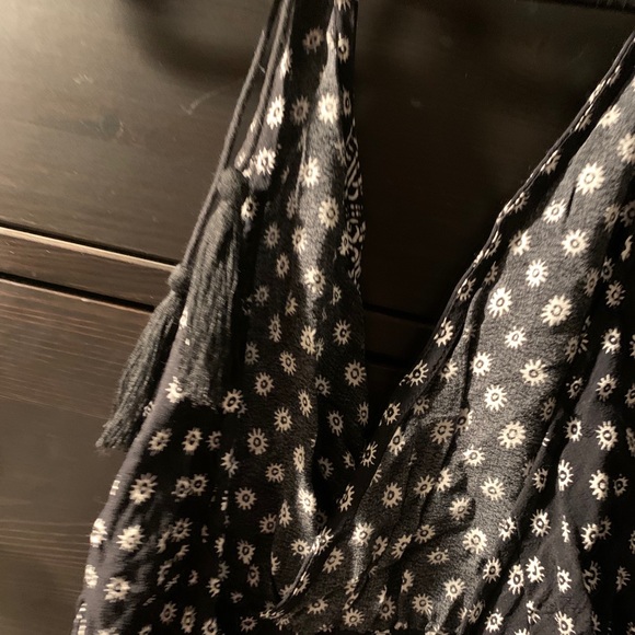 Olivaceous Black and White Halter Floral Patterned Romper - Picture 6 of 9